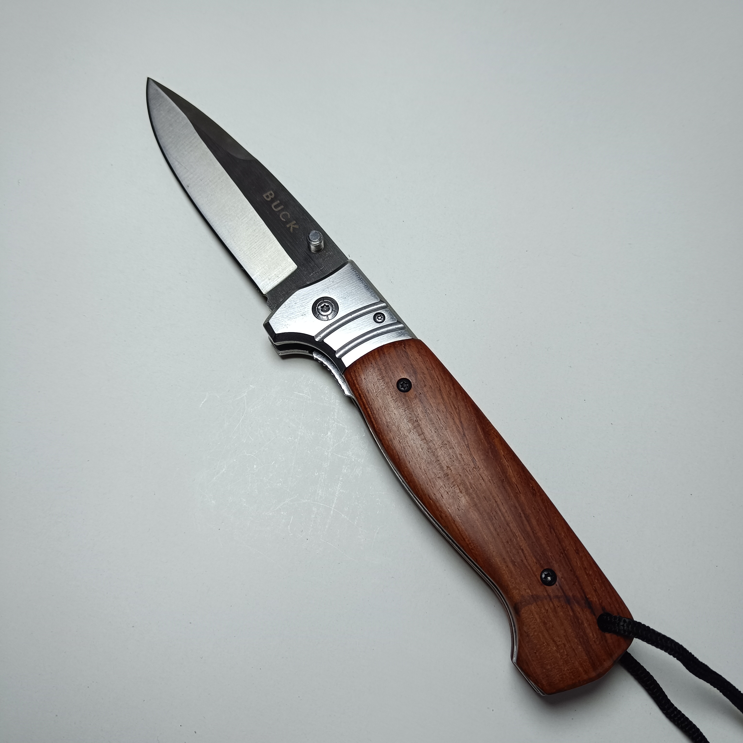 چاقوی تاشو طرح BUCK با دسته چوبی